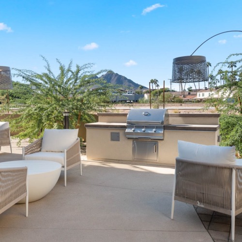 Grilling station and lush landscaping
